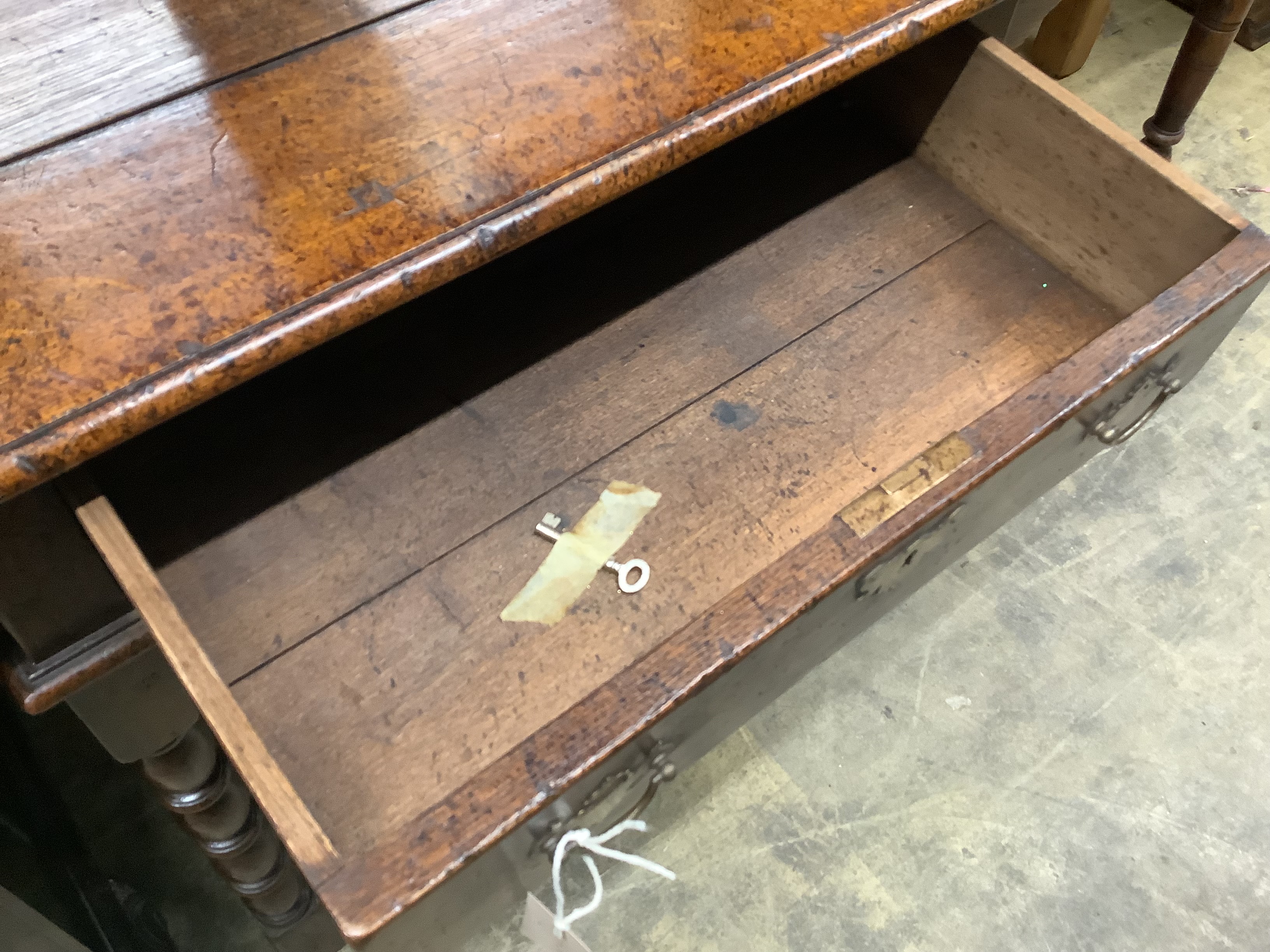A 17th century style oak side table